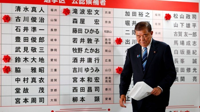 Japan’s prime minister signals intent to stay on despite election setback