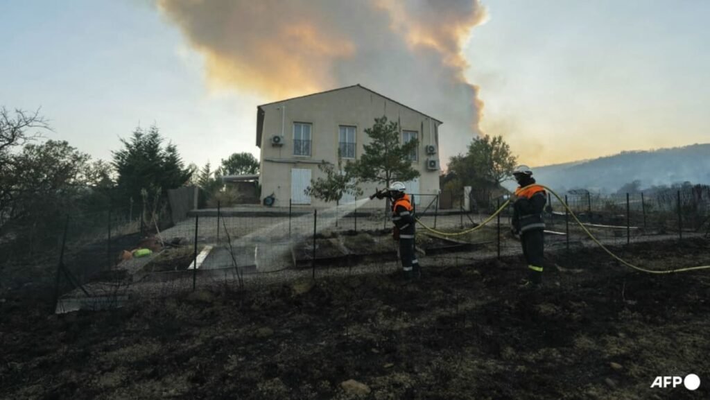 Fire in southern France burns 11,000 hectares, injures nine