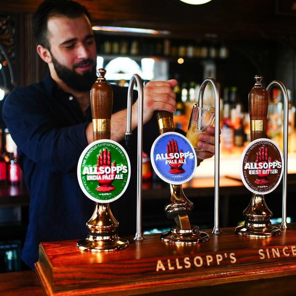 Why are British pubs named the way they are and what are the most common names?