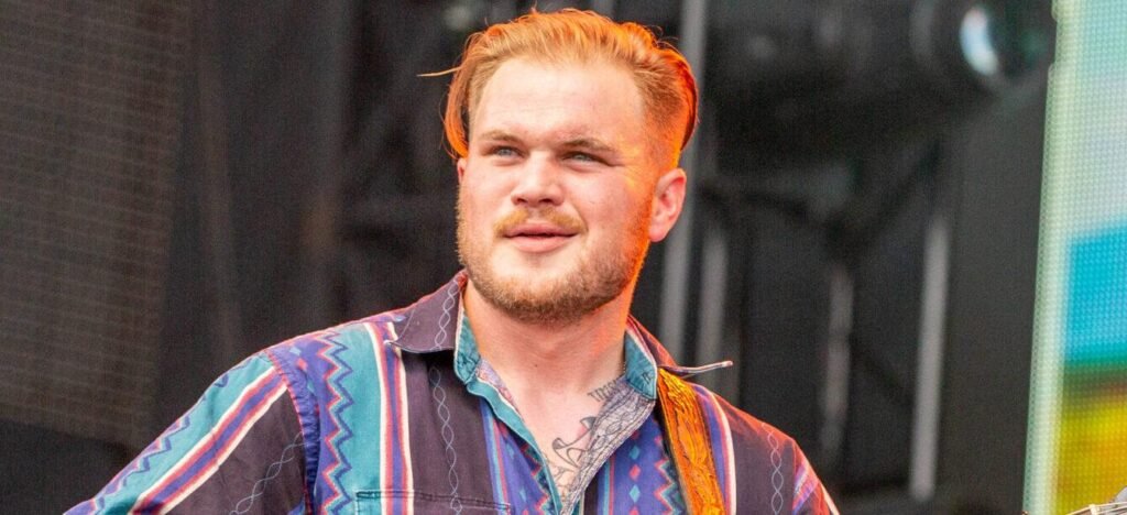 Zach Bryan Charges Country Singer Gavin Adcock Amid Ongoing Feud