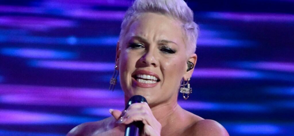 Pink Alarms Fans With IV Drip Photo After E. Coli Scare