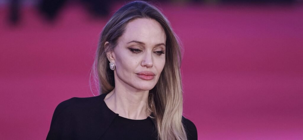 Angelina Jolie Puts Her Massive Tattoos On Display In Backless Gown