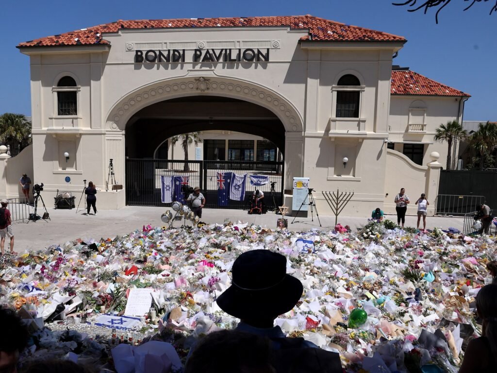 Australian police charge alleged Bondi Beach gunman as first funerals held | News