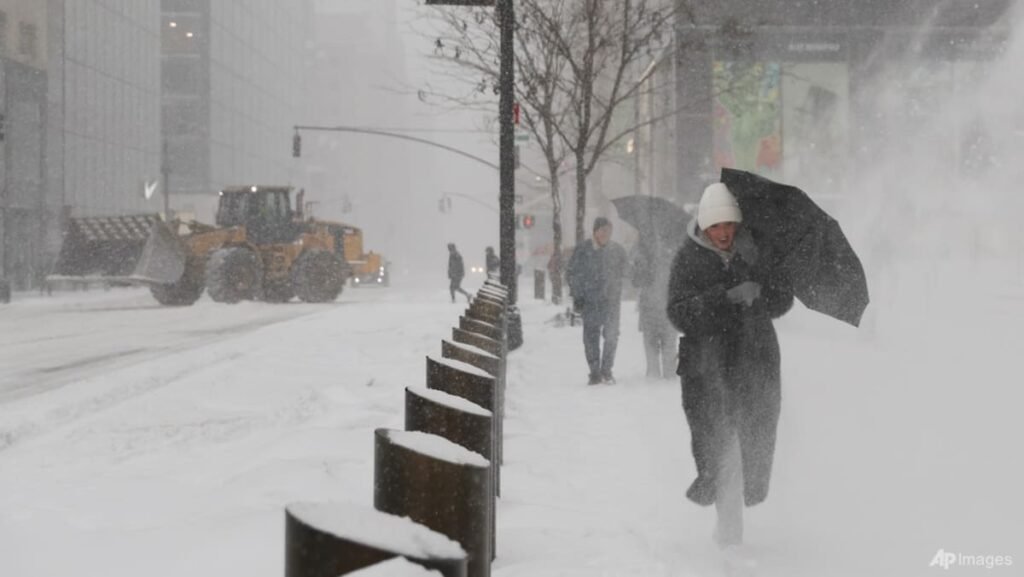 US sees more snow from the tail end of a colossal winter storm, at least 25 deaths reported