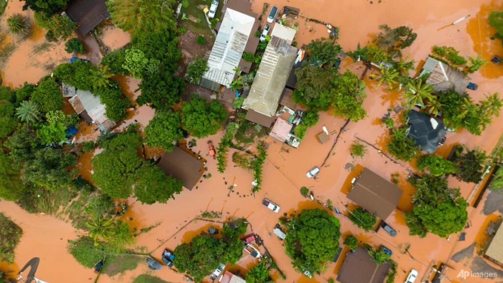 Over 5,500 told to evacuate flooding in Hawaii as officials warn 120-year-old dam could fail