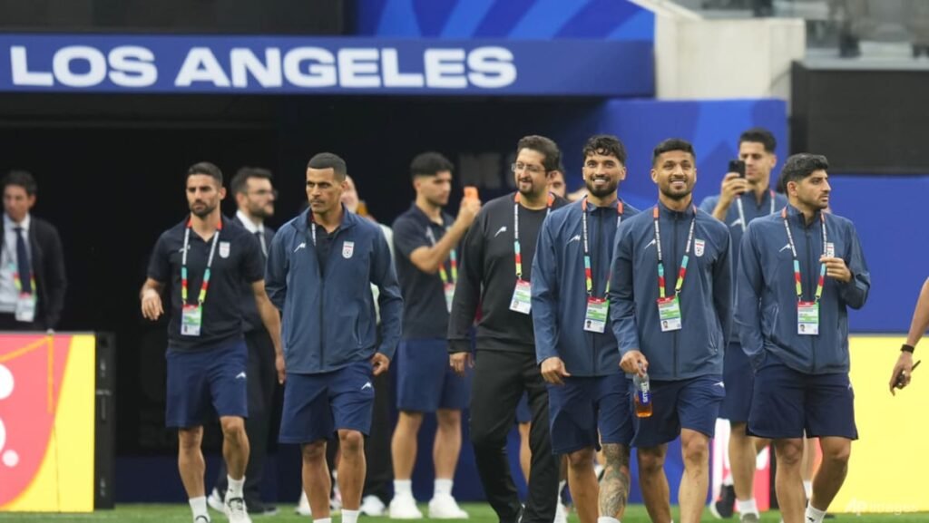 Iran take centre stage at World Cup as Spain make bow
