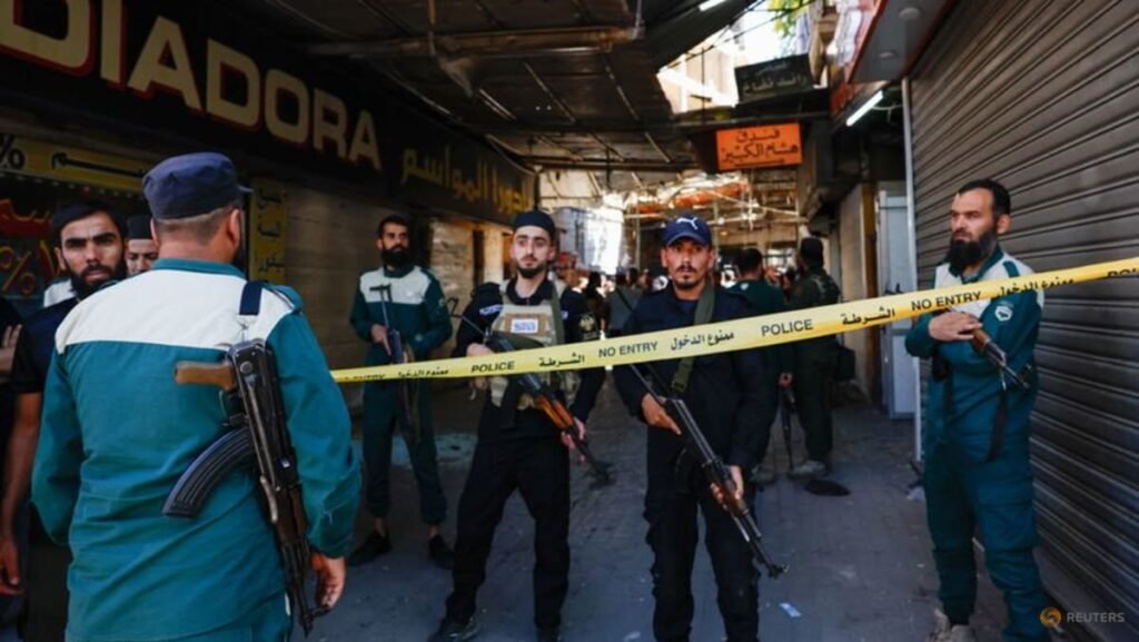 Bomb blast at Damascus cafe kills nine, authorities say