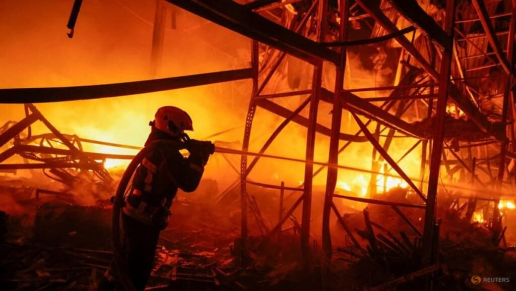 Russian missiles strike Kyiv districts, killing two, officials say