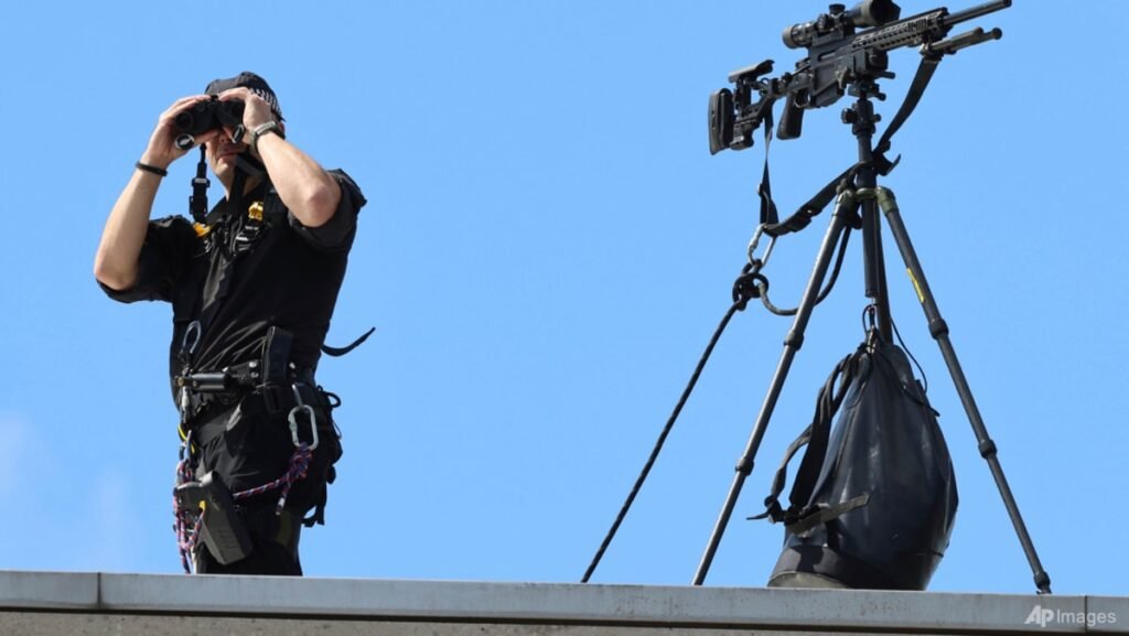 Scottish police arrest 15 after anti-migrant protest clashes