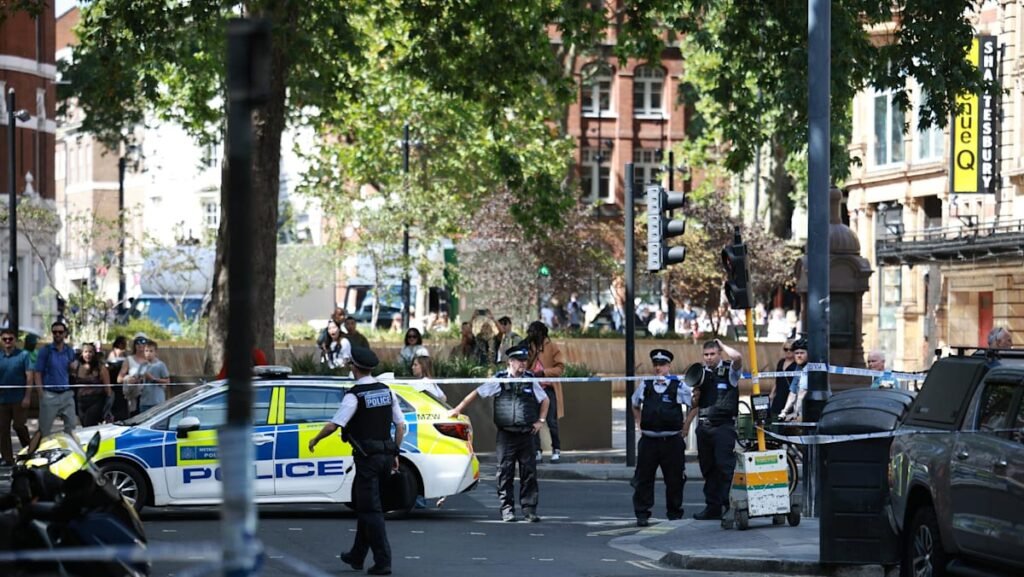 Woman arrested after four men stabbed in central London